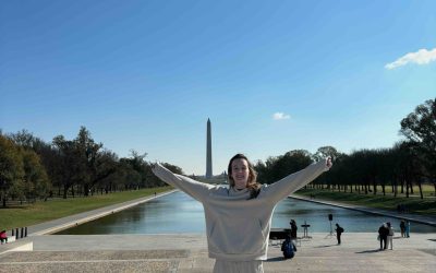 Amanda posing in front of the reflecting pool in Washington DC
