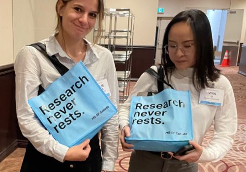 Aurelie and Vina showing off the bags they got from the endMS conference