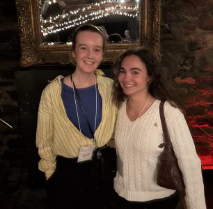Amanda and Christina standing next to each other and smiling