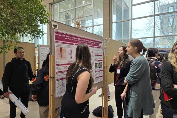 Lauren presenting her poster