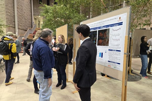 Manuel presenting his poster