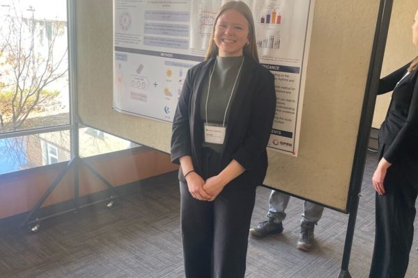 Mara at her poster