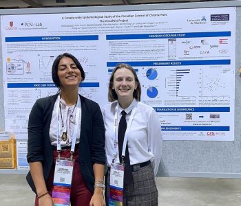 Doriana and Hailey present their poster at IASP, 2022