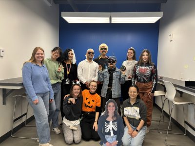 Lab dressed up for halloween. One person is photoshopped into the picture.